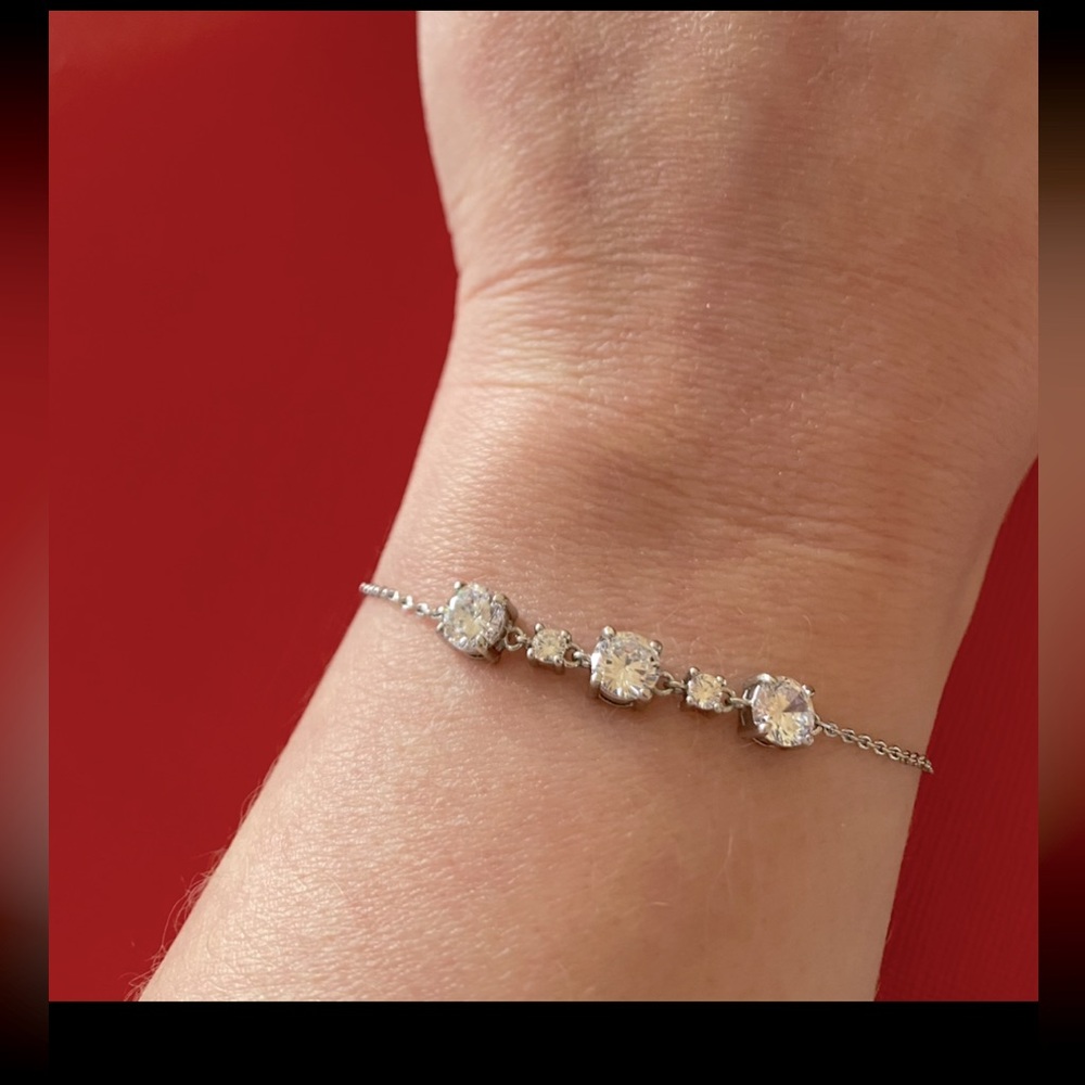 Charmed Aroma Rhodium Plated Silver Bracelet with Clear Cubic Zirconia Stones